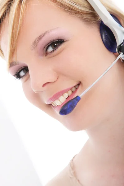 Pracownik kobiece call center z zestawu słuchawkowego — Zdjęcie stockowe
