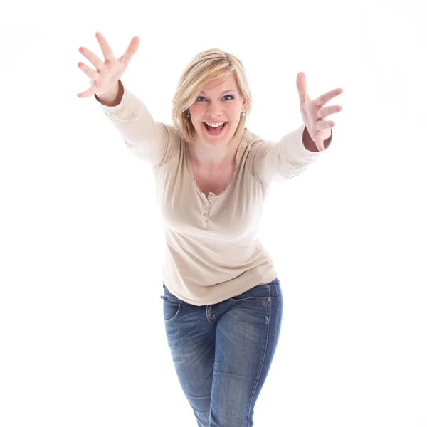 Woman with her arms outsretched in welcome Stock Photo