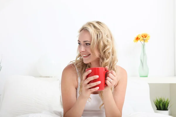 Woman looking off frame drinking coffee Royalty Free Stock Photos