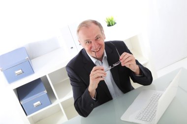 Happy middle-aged businessman clipart
