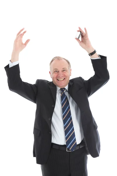 Uomo d'affari giubilante con le braccia alzate — Foto Stock