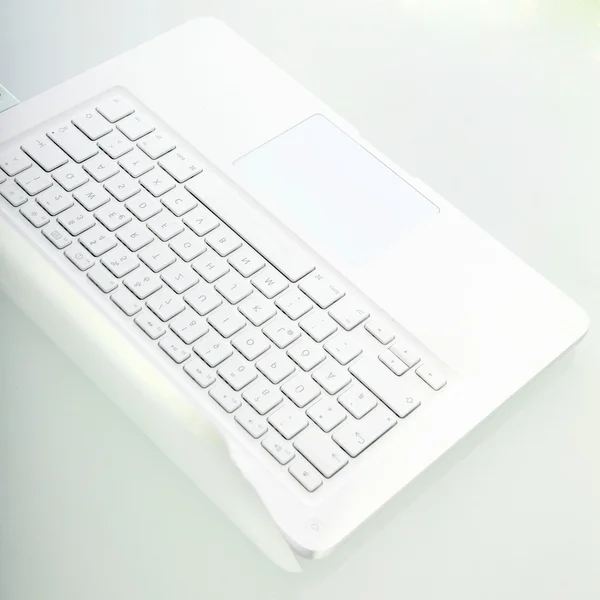 stock image Overhead view of open white laptop