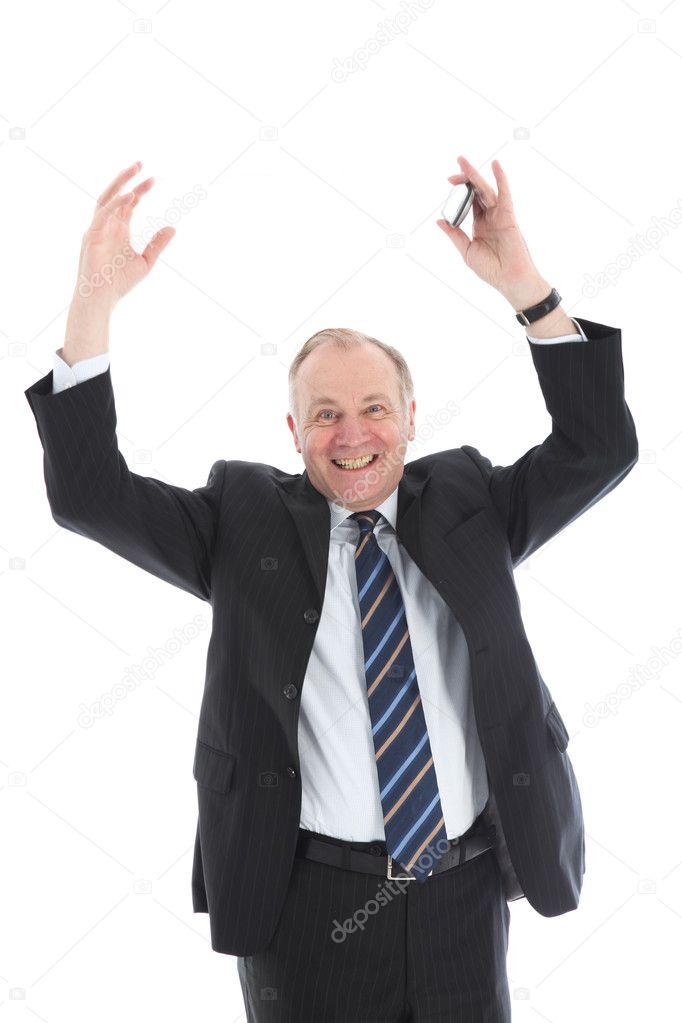 Jubilant businessman with arms raised