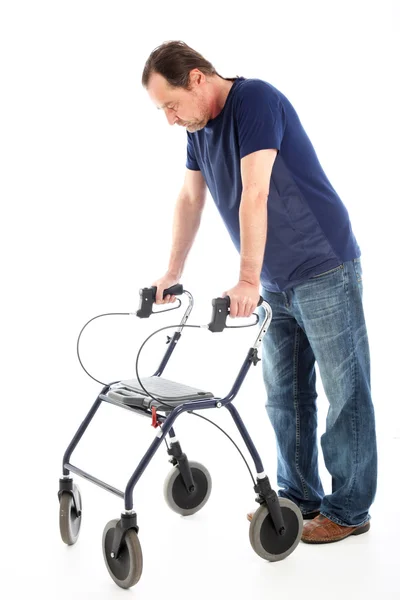 Despondent man on medical walker — Stock Photo, Image