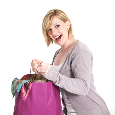 Ecstatic shopaholic with full carrier bag clipart