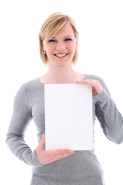 Mulher amigável segurando sinal em branco vertical — Fotografia de Stock
