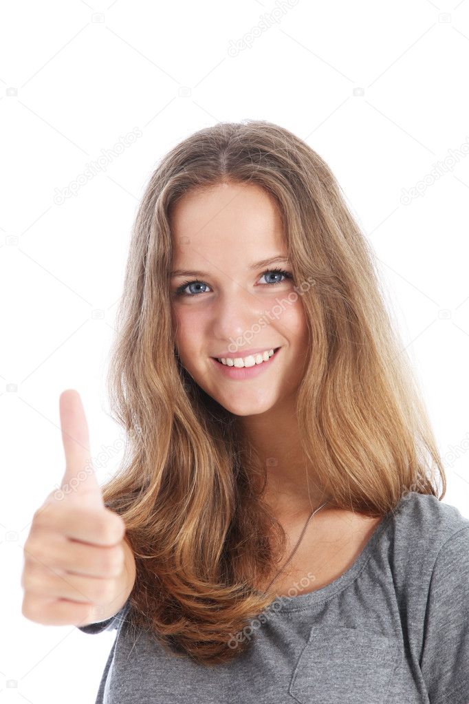 Smiling student giving a thumbs up