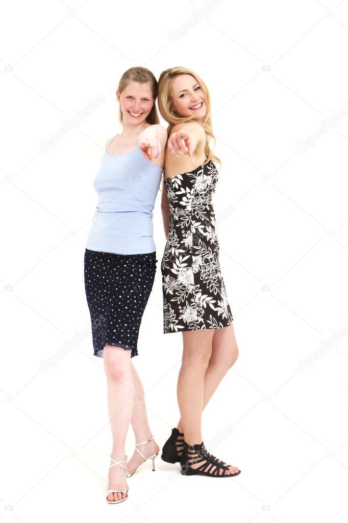 Laughing women pointing at the camera