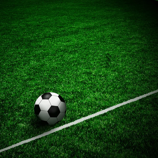 Yeşil sahada futbol topu — Stok fotoğraf