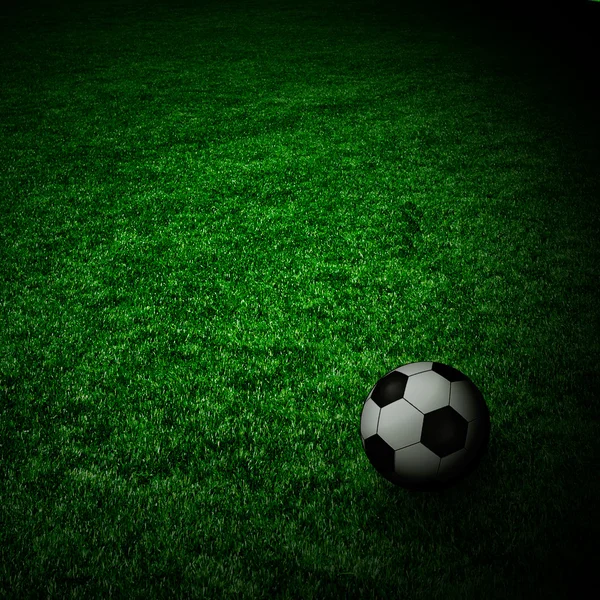 Pelota de fútbol en el campo verde —  Fotos de Stock