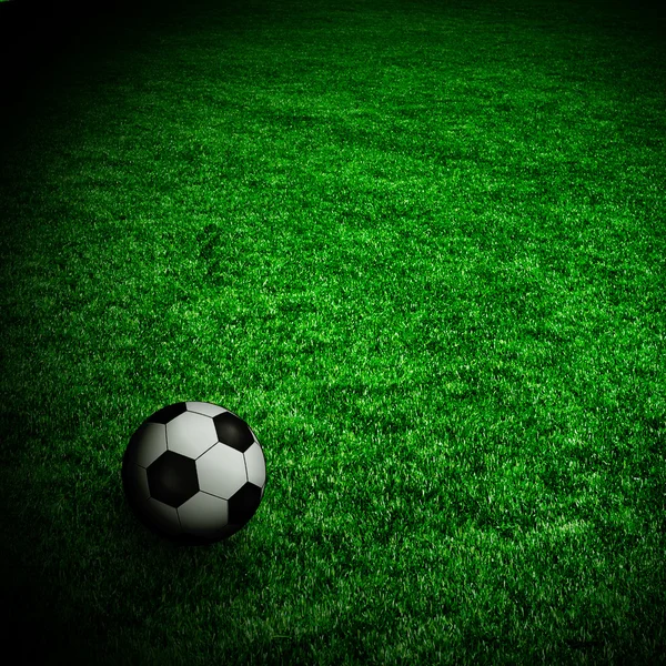Soccer ball on the green field — Stock Photo, Image