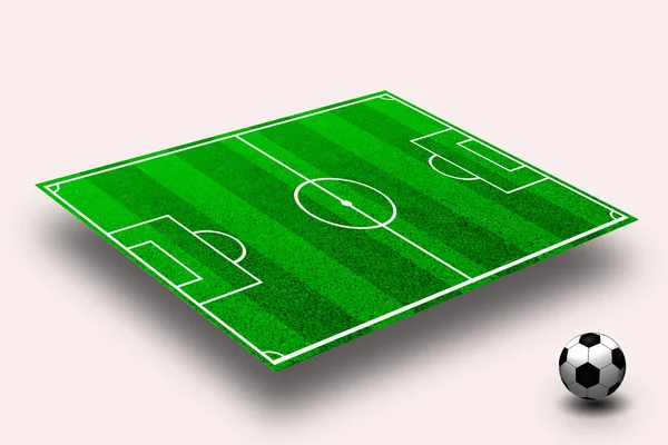 Зеленое футбольное поле с линиями и мячом — стоковое фото