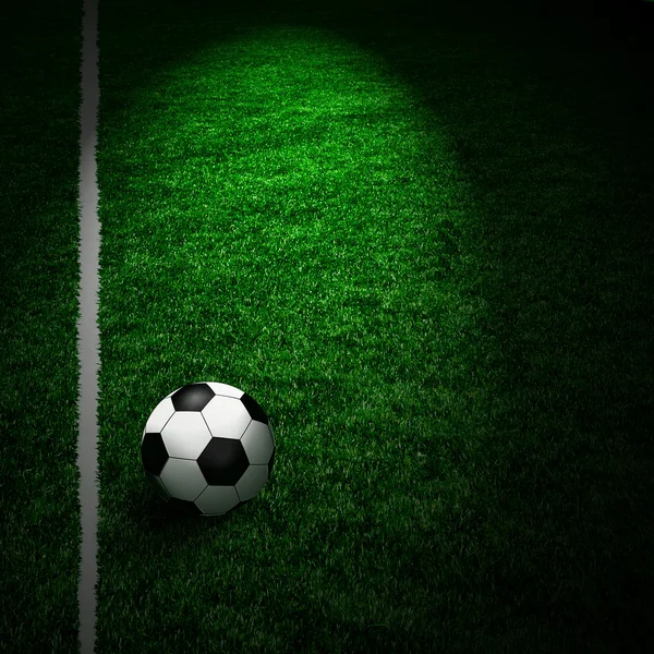Voetbal op het groene veld — Stockfoto
