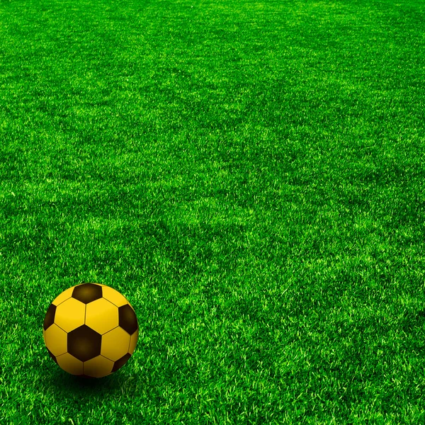 Yeşil çimenlerin üzerinde altın futbol topu. yeşil çim dokusu — Stok fotoğraf