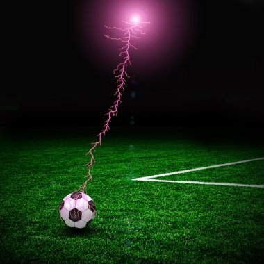 Soccer ball on the green field and lightning clipart