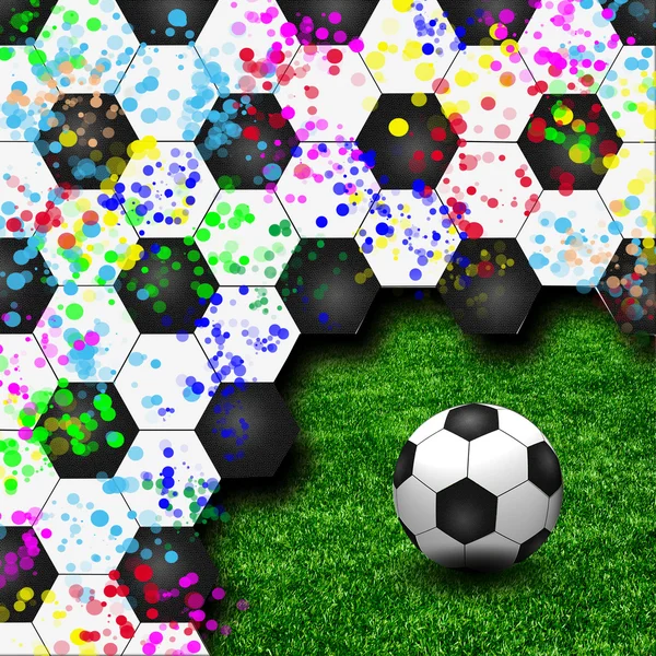 Yeşil çimen yaratıcı arka plan olarak bir futbol topu — Stok fotoğraf