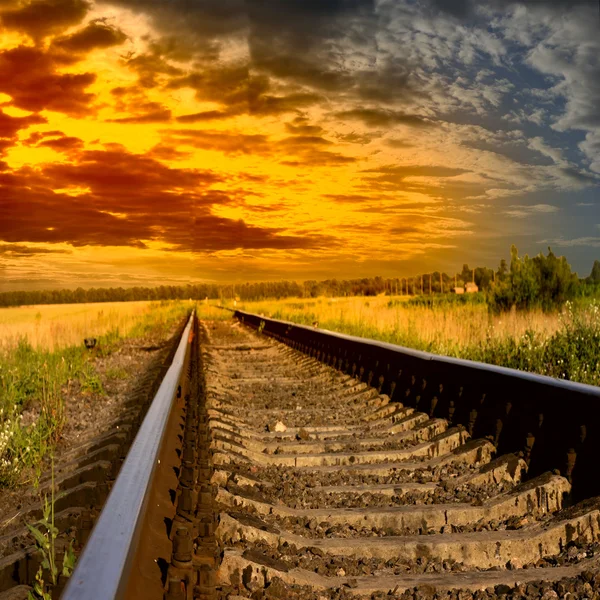 A naplementébe vasúti — Stock Fotó