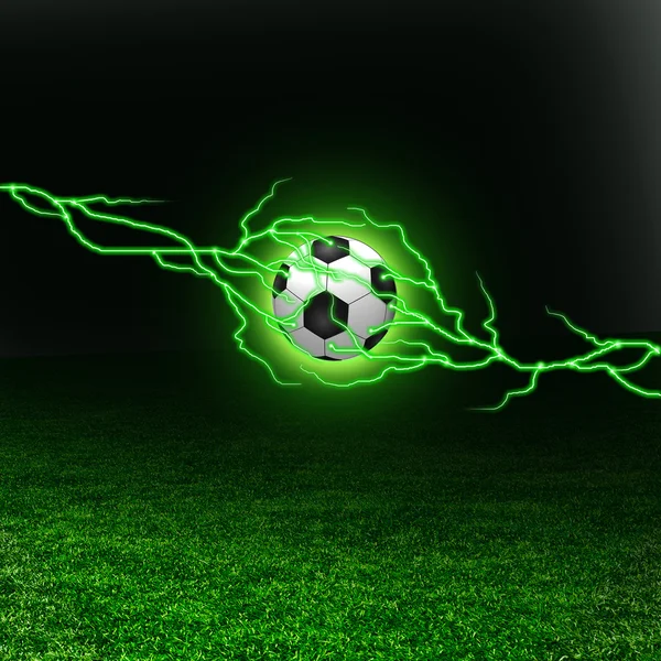 Pelota de fútbol en el campo verde con relámpagos — Foto de Stock