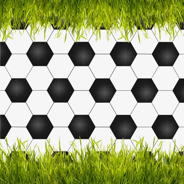 創造的な背景として緑の芝生とサッカー ボール — ストック写真