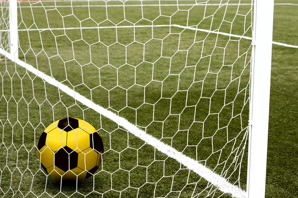 stock image Goal. a soccer ball in a net.