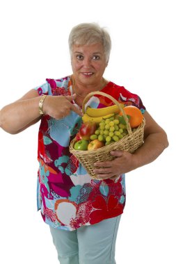 Female senior with fresh fruits clipart