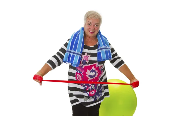Female senior woman exercises — Stock Photo, Image
