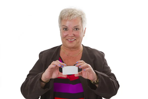 Kvinnliga senior med visitkort — Stockfoto
