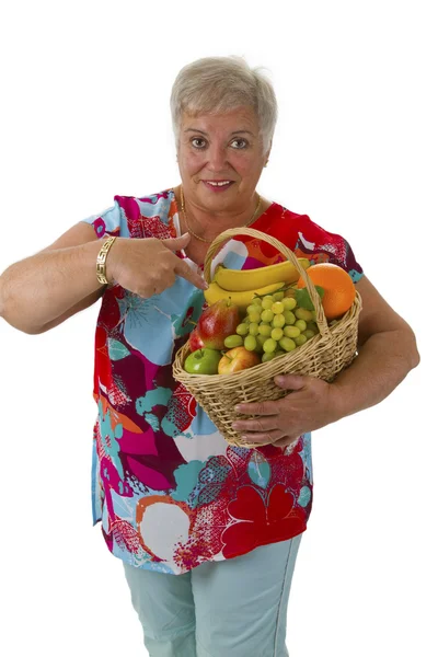 Samice starší s čerstvým ovocem — Stock fotografie