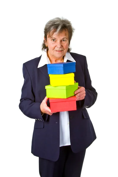 Female senior with gift boxes — Stock Photo, Image
