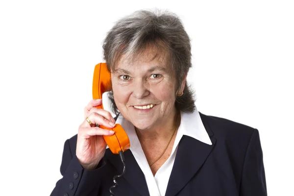 電話での女性の年長の主任 — ストック写真