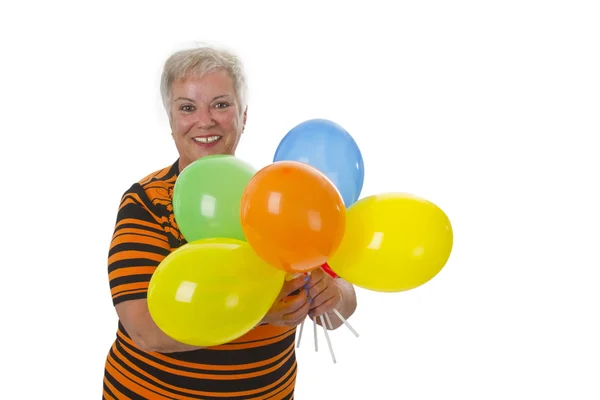 Female senior with colorful ballons — Stock Photo, Image