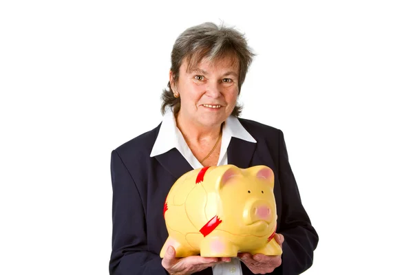 Feminino sênior com banco porquinho — Fotografia de Stock