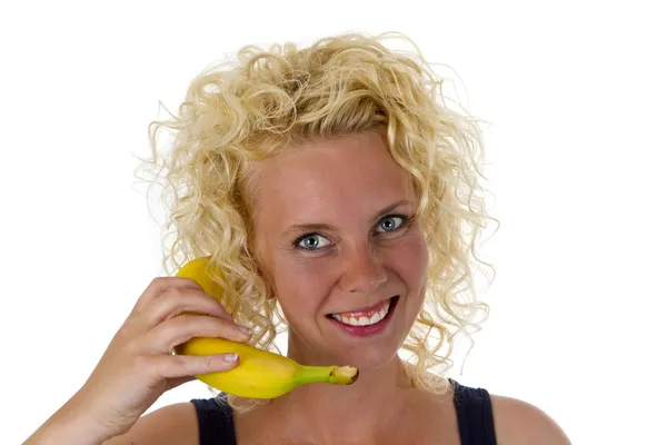 Beautiful young woman with banana — Stock Photo, Image