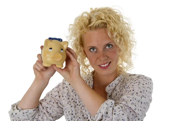 Beautiful young woman with piggy bank — Stock Photo, Image