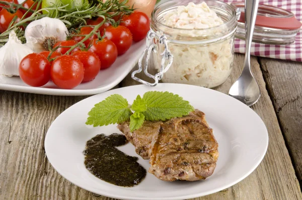 Lamb steak with coleslaw — Stock Photo, Image