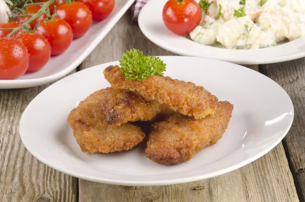 Chicken nuggets with potato salad — Stock Photo, Image