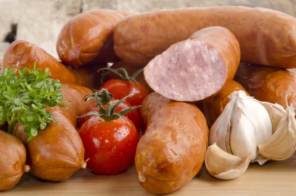 Sausage on a wooden board — Stock Photo, Image