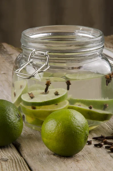Pickled limes in a glass — Stock Photo, Image