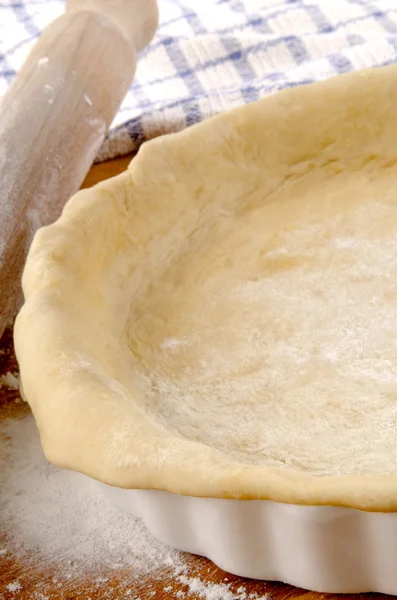 Quiche dough is placed in a baking form — Stock Photo, Image