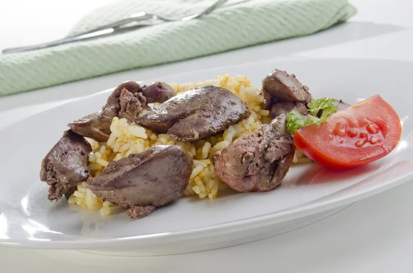 Chicken liver with curried rice — Stock Photo, Image