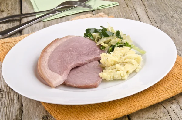 Bacon with cabbage and mashed potato — Stock Photo, Image