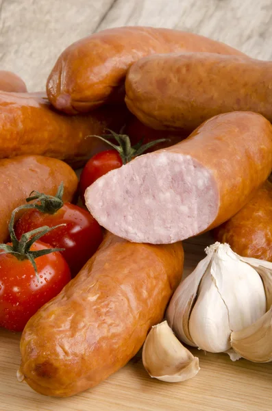 Sausage on a wooden board — Stock Photo, Image