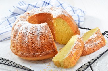 Lemon gugelhupf with icing sugar clipart