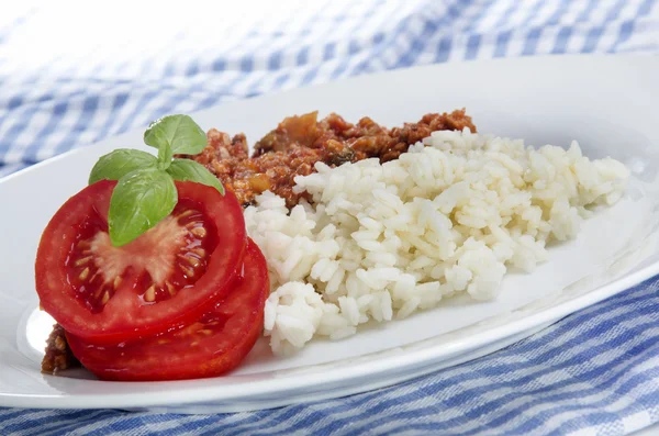 Rice with minced meat and tomato — Stock Photo, Image