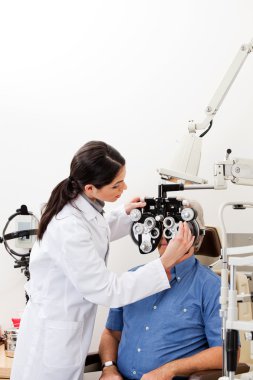 Eye Checkup With Phoropter clipart