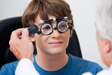 Eye Test Through Trial Frames clipart