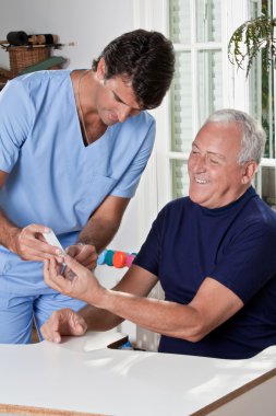 Doctor taking a Blood Sample clipart