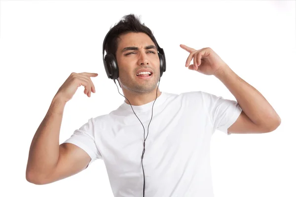 Adam üzerinde kulaklık müzik dinleme — Stok fotoğraf