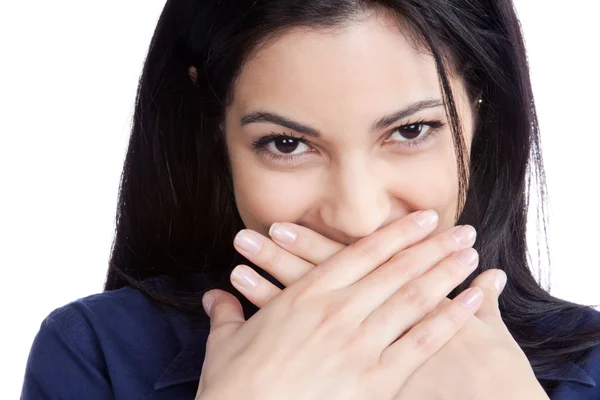 Glad ung kvinna som täcker munnen — Stockfoto