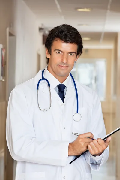 Doctor Writing Report Stock Picture